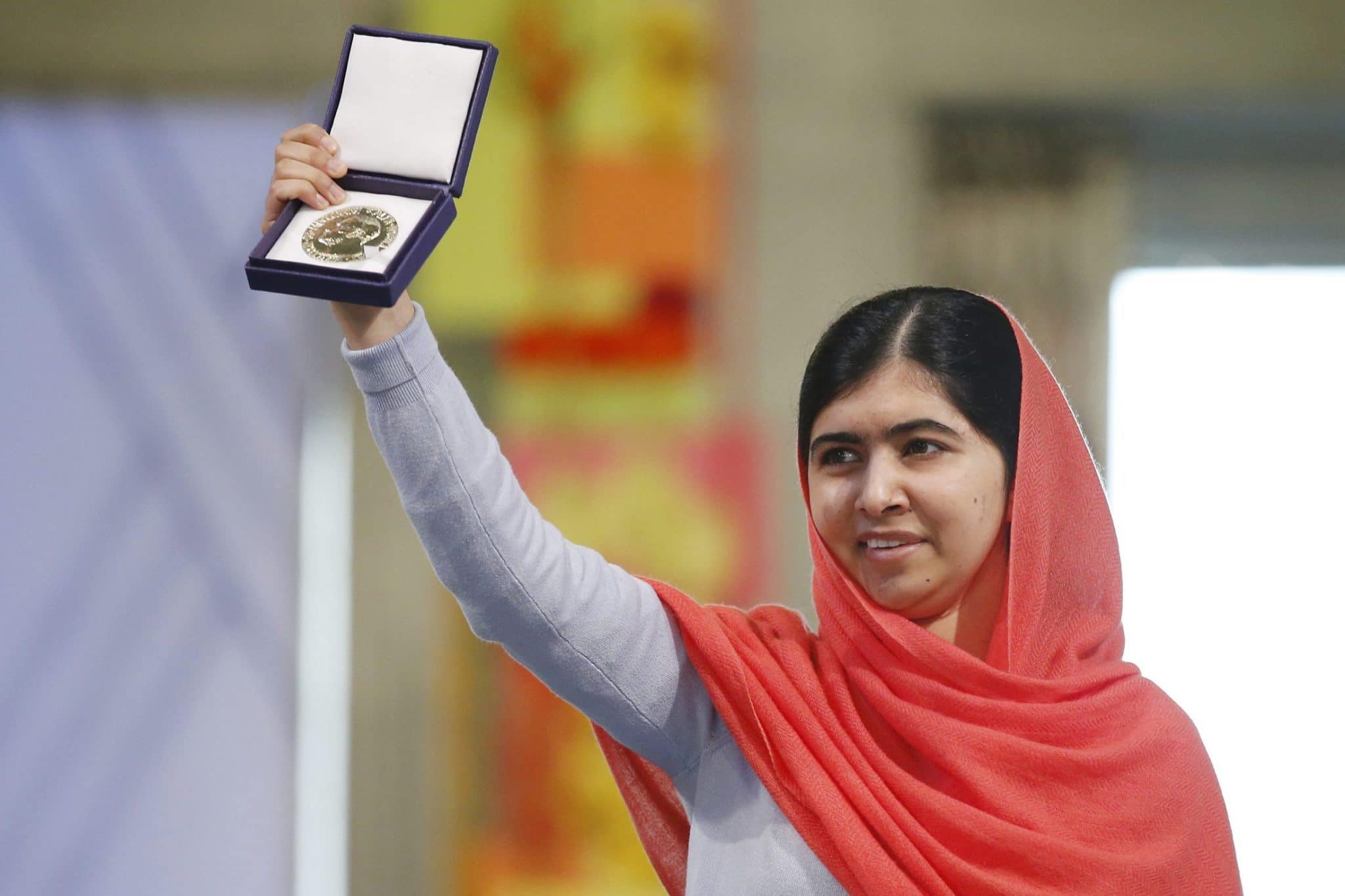 Nobel Peace Prize laureate Yousafzai poses with her medal