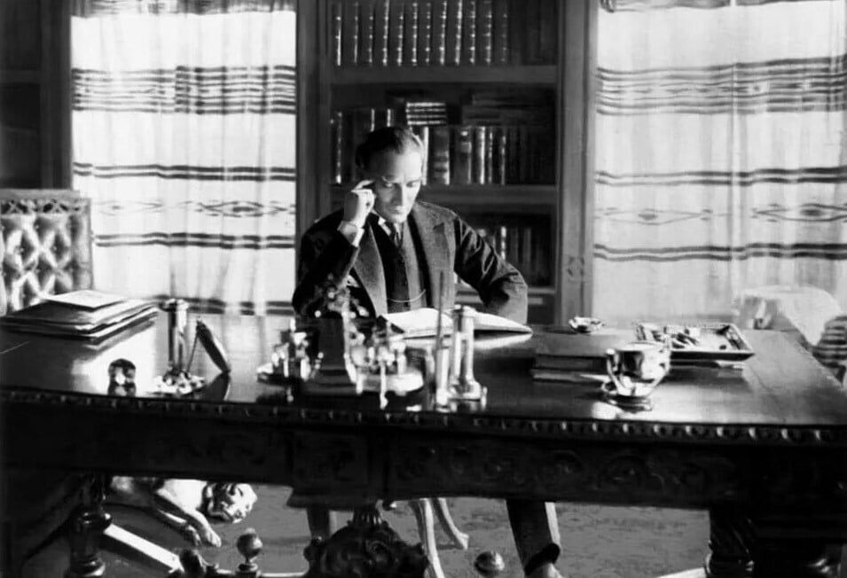 Ataturk sitting in his library, thinking about his next leadership move