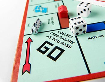 Monopoly board game. This game was developed in 1934 by an American, Mr Charles Darrow. Today, Monopoly is the best-selling board game in the world, produced in 26 languages and sold in 80 countries. The game and design are trademarks of Parker Brothers.