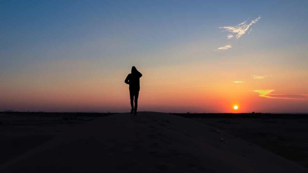 Person watching the sunset in Africa