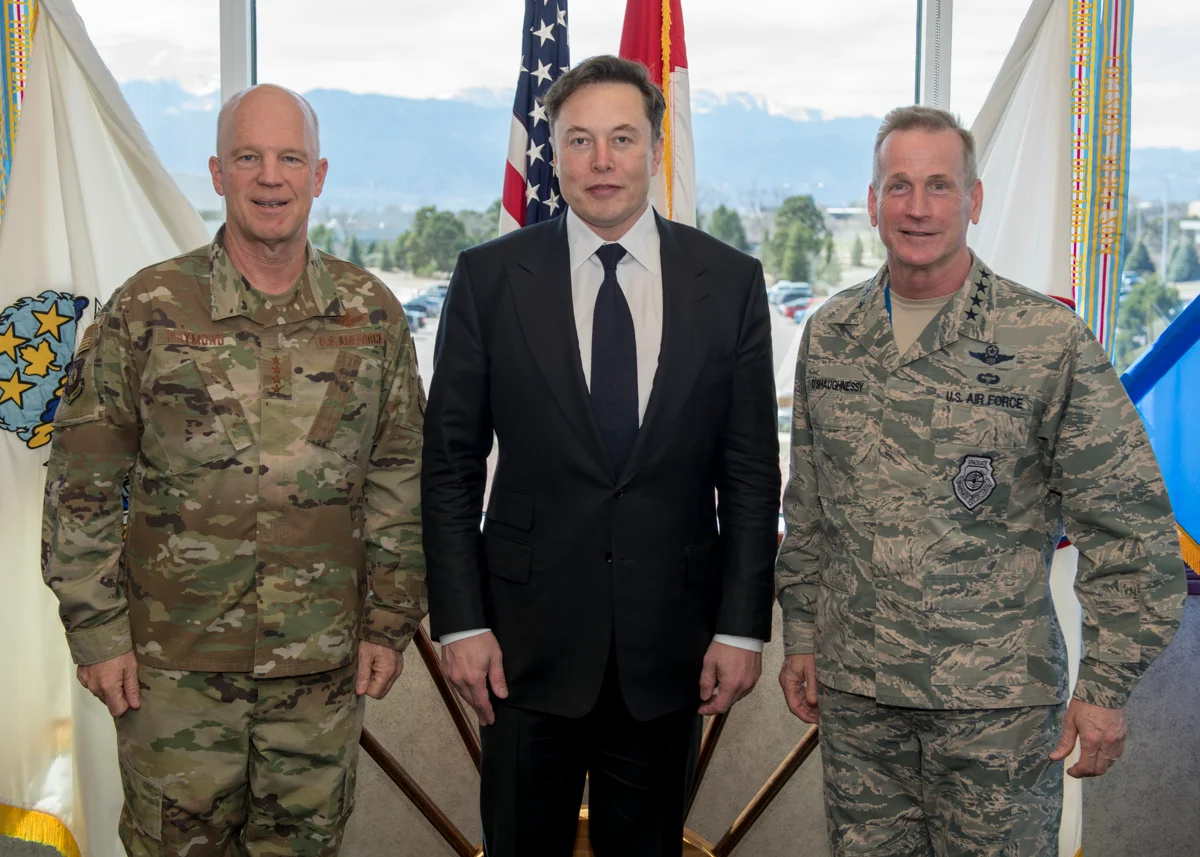 SpaceX CEO Elon Musk (center), the Commander, Air Force Space Command, and Joint Force Space Component Commander, Gen. Jay Raymond (left), and the Commander of the North American Aerospace Defense Command and U.S. Northern Command, U.S. Air Force General Terrence J. O’Shaughnessy pose for a photo in the command’s headquarters in Colorado Springs, Colorado, April 15, 2019. During Musk’s visit, he participated in conversations and round table briefings about future space operations and homeland defense innovation.